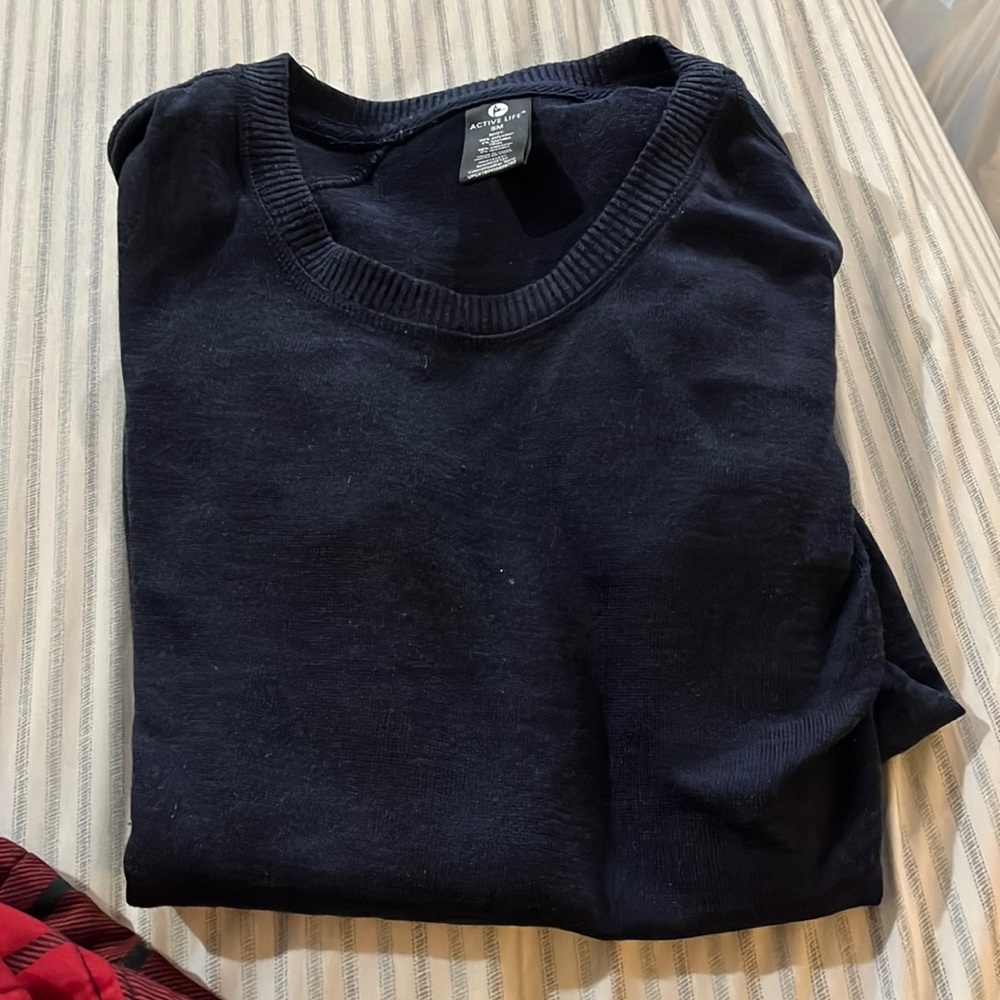 Long sleeve, zippers on the bottom sides